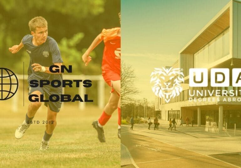 Student-athlete in a football kit standing in front of a historic English university campus, representing the UK play and study pathway.